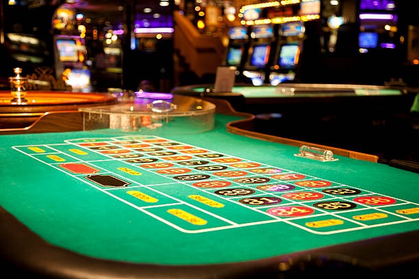 Live blackjack table with professional dealer and multiple betting positions